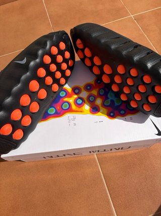Chanclas Nike Wind Negras y Naranjas