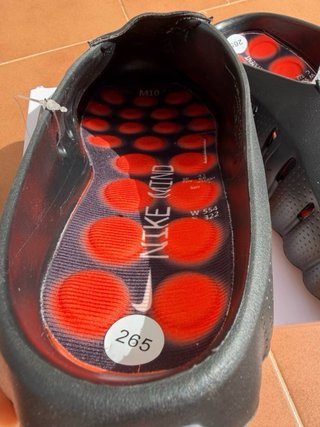 Chanclas Nike Wind Negras y Naranjas