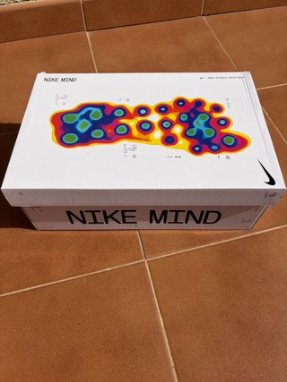 Chanclas Nike Wind Negras y Naranjas