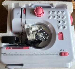 Mini Máquina de Coser Eléctrica Rosa