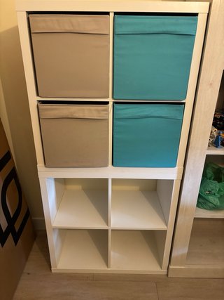 2 Muebles Kallax Ikea como nuevos con 4 cajas tela