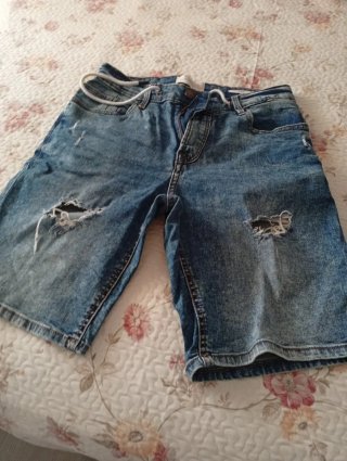 Bermudas vaqueras hombre rotas