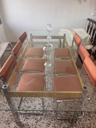 Mesa de comedor de cristal con 6 sillas