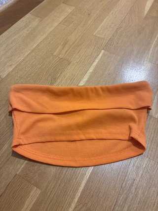 Top banda elástico naranja