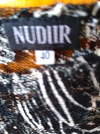 Blusa Nudur Fiesta Negra y blanca con trasparencia