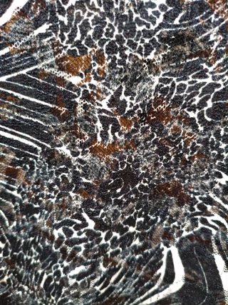 Blusa Nudur Fiesta Negra y blanca con trasparencia