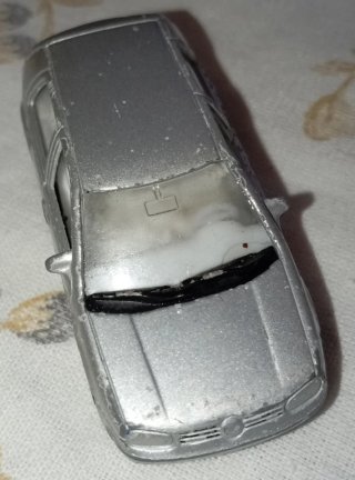 Coche de juguete Volkswagen Golf Plata marca Welly