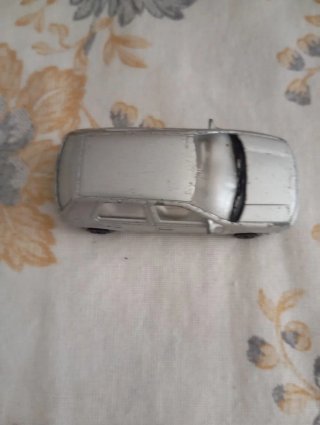 Coche de juguete Volkswagen Golf Plata marca Welly