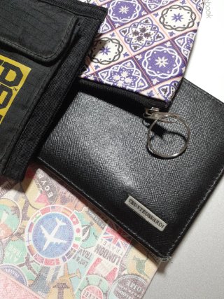 Portamonete nero e viola tutti 5 € ok
