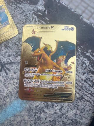 Carta Pokémon Blaziken VMAX Dorada