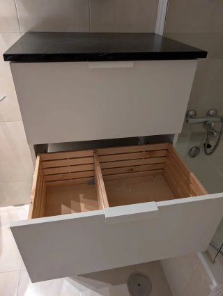 Mueble baño cajones encimera mármol negro