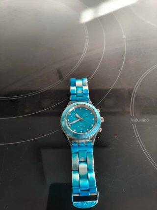 Reloj Swatch Azul y Plateado