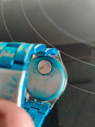 Reloj Swatch Azul y Plateado