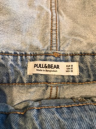 Mono vaquero corto desgastado