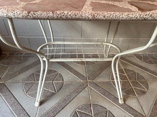 Mesa de patio con mosaico de piedra