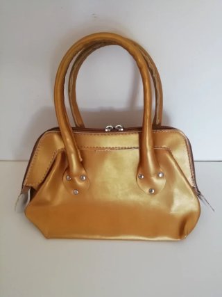 Bolso de mano dorado vintage