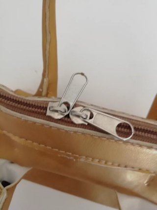 Bolso de mano dorado vintage