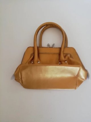 Bolso de mano dorado vintage