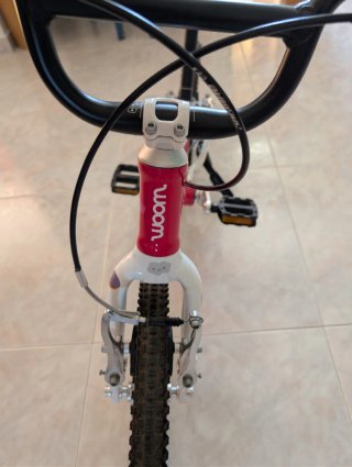 Bicicleta infantil Woom 14 color rosa