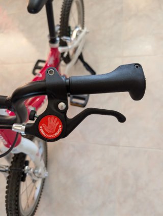Bicicleta infantil Woom 14 color rosa