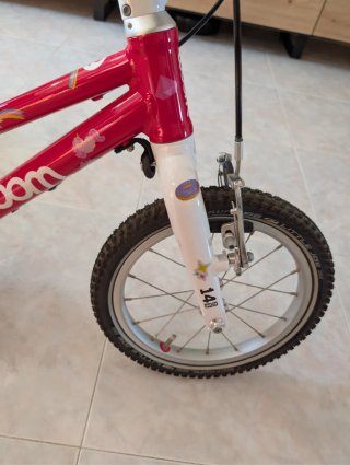 Bicicleta infantil Woom 14 color rosa