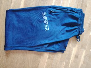 Pantalones cortos grises  y largos azul LEGEA