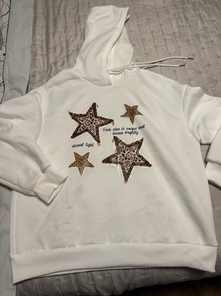 Sudadera con capucha y estrellas