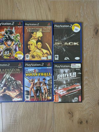 PlayStation 2 Nera + 8 giochi