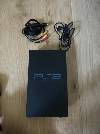 PlayStation 2 Nera + 8 giochi