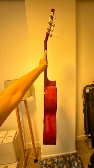 Guitarra Clásica + afinador + Libro + pua y bolsa