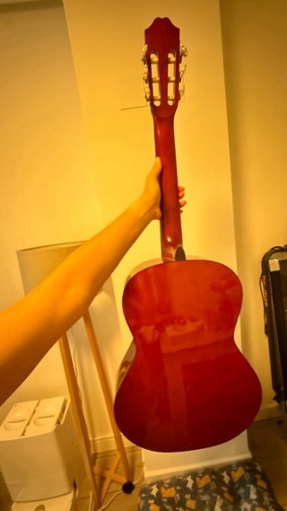 Guitarra Clásica + afinador + Libro + pua y bolsa