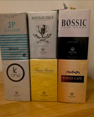 Lote 40 profumi uomo e donna Sunset World