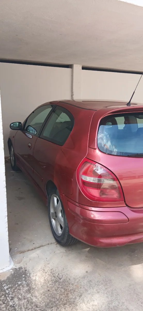 Nissan Almera 2001 - foto 1