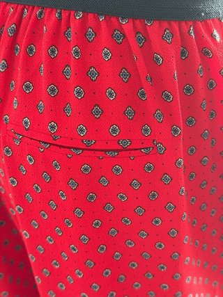 Pantalón ancho Mango rojo estampado