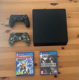 PS4 Slim Nera + 2 Controller + 2 Giochi