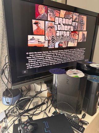 PlayStation 2 Slim Nera + 6 Giochi
