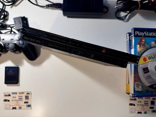 PlayStation 2 Slim Nera + 6 Giochi