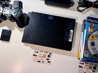 PlayStation 2 Slim Nera + 6 Giochi