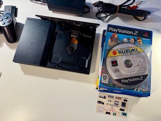 PlayStation 2 Slim Nera + 6 Giochi