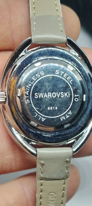 Reloj Swarovski Beige y Plateado