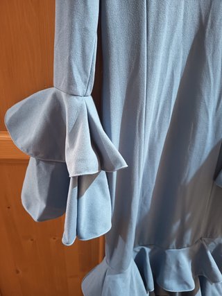 Traje de flamenca azul con volantes