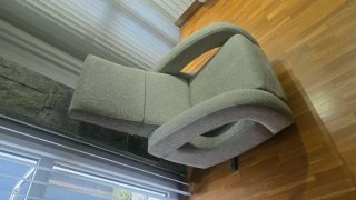 Sillón reclinable gris tela