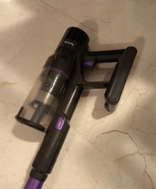 Aspiradora de mano morada