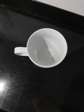 Taza Tacha de porcelana blanca