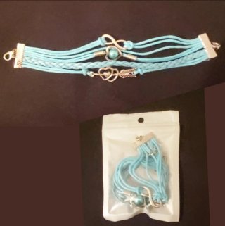 Pulsera multicapa con dijes