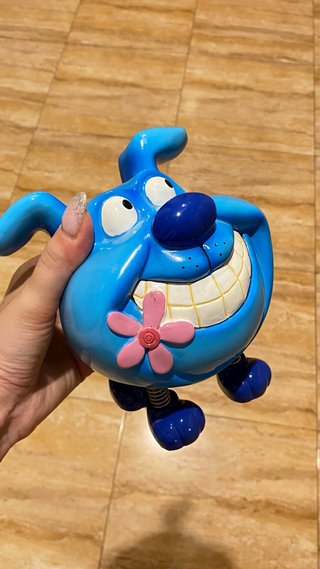 Hucha azul con flor rosa