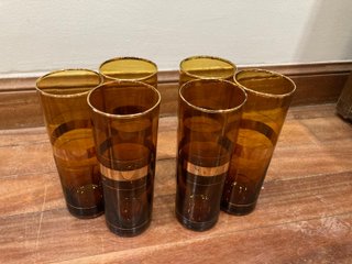 Juego licorera y 5 vasos ámbar