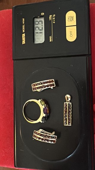 conjunto de oro piedras