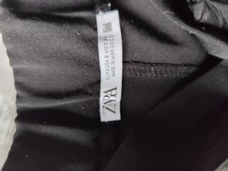 Pantalones negros anchos con cinturón