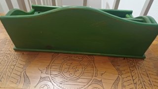 Adorno vintage de madera verde